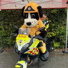 Derbyshire Blood Bike at event with Derbyshire Fire Service mascot sat on the bike